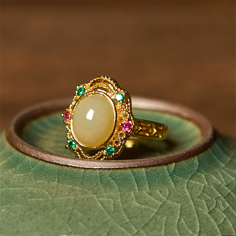 Anillo de la suerte abierto de cobre con diseño hueco de huevo de jade hetiano natural y Buddha Stones
