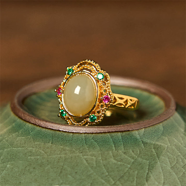 Anillo de la suerte abierto de cobre con diseño hueco de huevo de jade hetiano natural y Buddha Stones