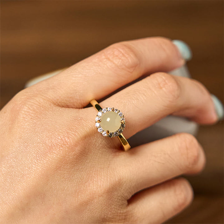 Anillo de cobre con forma de huevo de jade hetiano natural y Buddha Stones para la suerte y la prosperidad