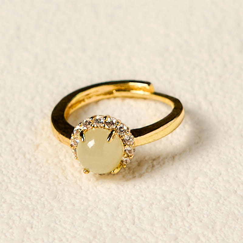 Anillo de cobre con forma de huevo de jade hetiano natural y Buddha Stones para la suerte y la prosperidad