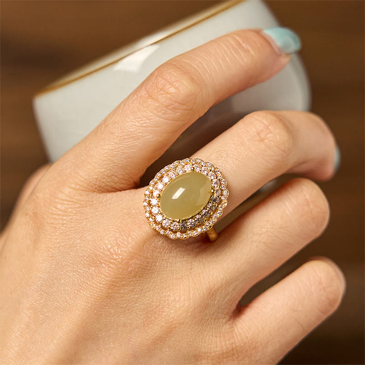 Anillo de abundancia abierto de cobre con circonita y doble círculo hueco de jade hetiano natural con Buddha Stones