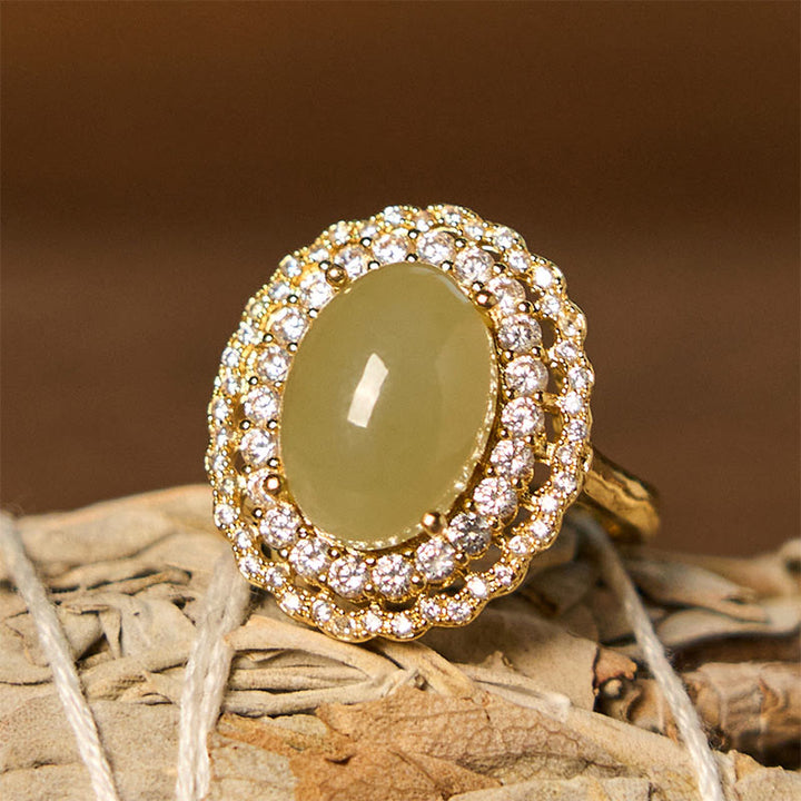 Anillo de abundancia abierto de cobre con circonita y doble círculo hueco de jade hetiano natural con Buddha Stones