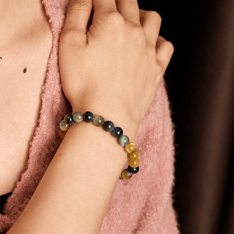 Pulsera de equilibrio con cabeza de Buda y ojo de tigre azul, verde y rojo con Buddha Stones
