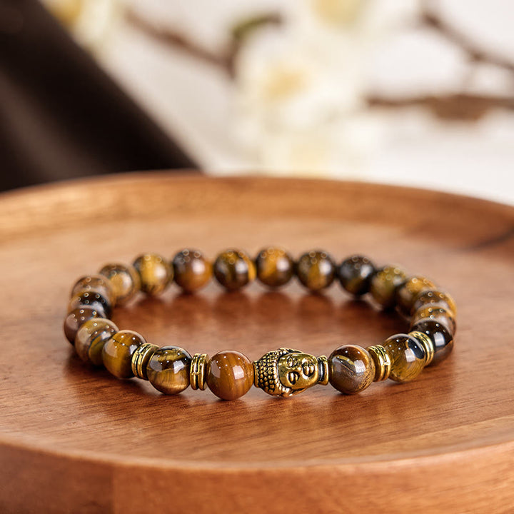 Pulsera de equilibrio con cabeza de Buda y ojo de tigre azul, verde y rojo con Buddha Stones