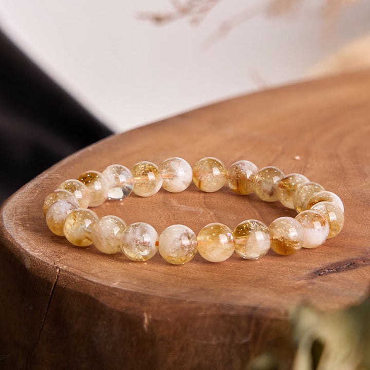 Pulsera de prosperidad con copos de nieve de cristal citrino natural de Buddha Stones