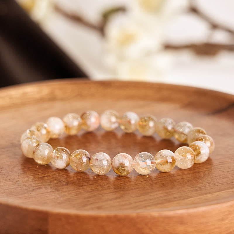Pulsera de prosperidad con copos de nieve de cristal citrino natural de Buddha Stones