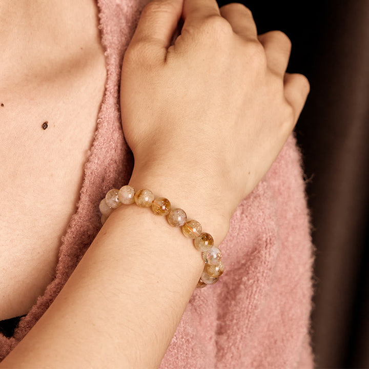 Pulsera de prosperidad con copos de nieve de cristal citrino natural de Buddha Stones