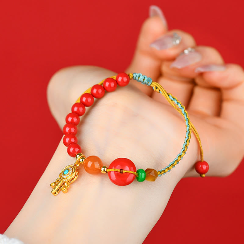 Pulsera con bendición de la paz con hilo de cinabrio y Buddha Stones