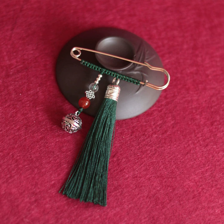 Broche con borlas y campanas retro de Buddha Stones