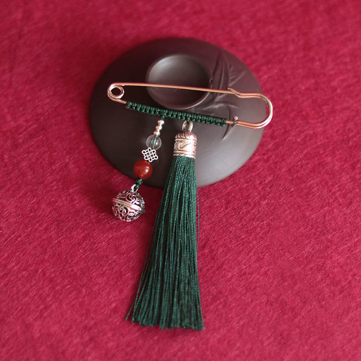 Broche con borlas y campanas retro de Buddha Stones