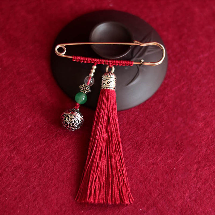 Broche con borlas y campanas retro de Buddha Stones