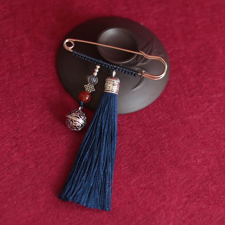 Broche con borlas y campanas retro de Buddha Stones