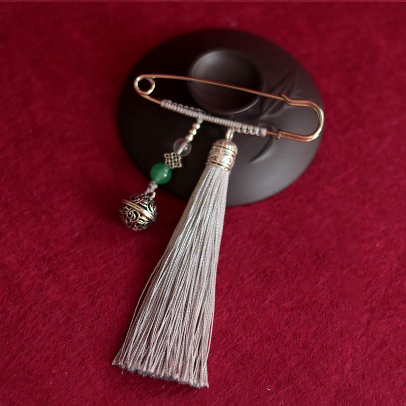 Broche con borlas y campanas retro de Buddha Stones