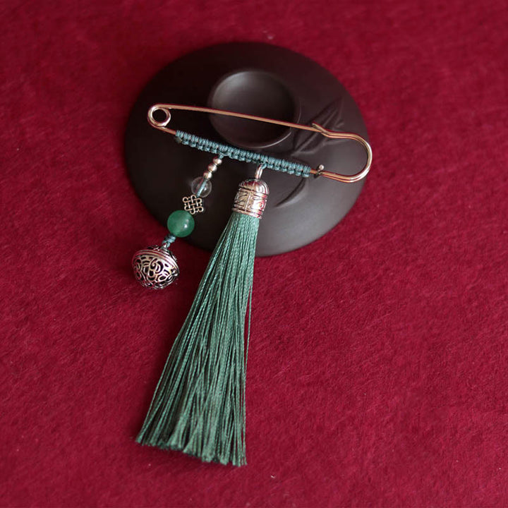 Broche con borlas y campanas retro de Buddha Stones