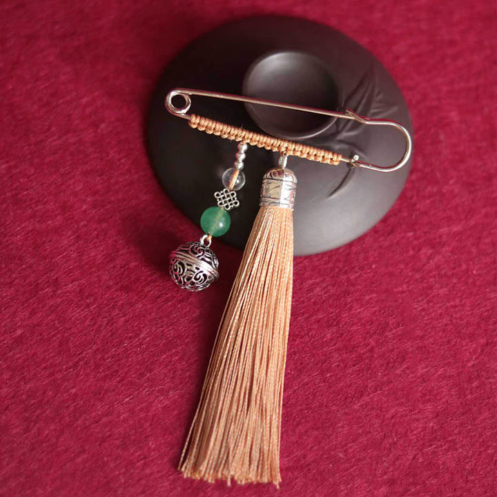 Broche con borlas y campanas retro de Buddha Stones
