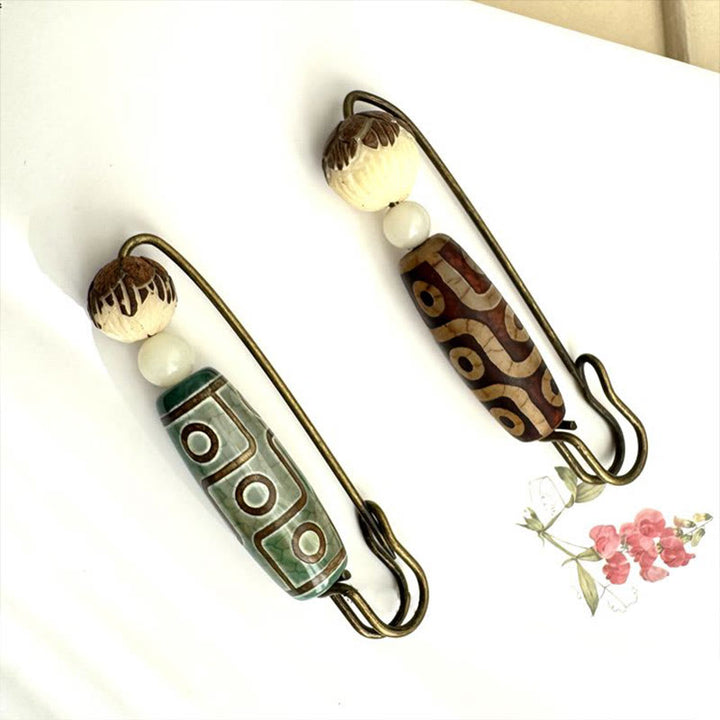 Broche protector de loto con semillas de Bodhi y cuentas Dzi de nueve Buddha Stones