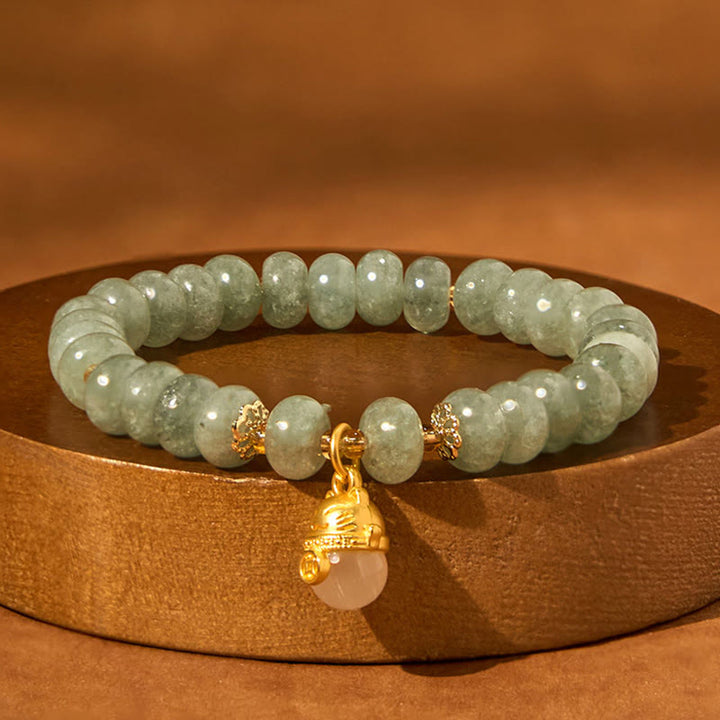 Pulsera curativa con cuentas de gato de la suerte de jade cian y cuarzo fresa y Buddha Stones