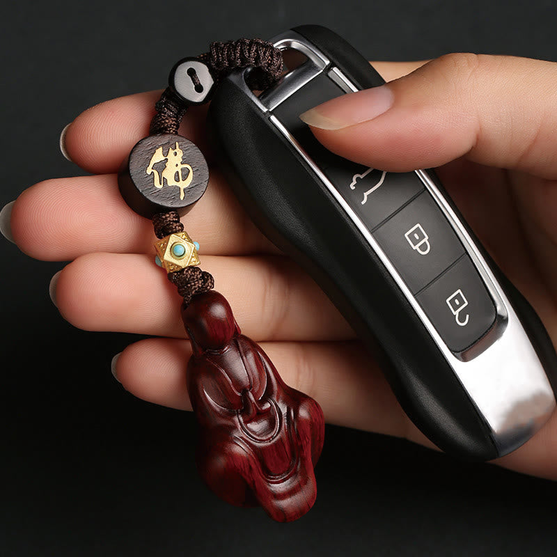 Llavero con protección de Buddha Stones sin forma de sándalo rojo con hojas pequeñas y piedras de Buda