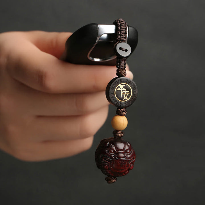 Llavero con protección de seguridad y bienestar de PiXiu con hojas pequeñas de sándalo rojo y Buddha Stones