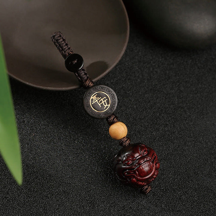 Llavero con protección de seguridad y bienestar de PiXiu con hojas pequeñas de sándalo rojo y Buddha Stones