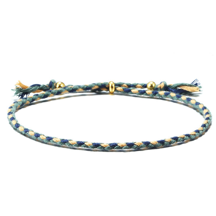 Pulsera de armonía ajustable con borlas trenzadas de cuerda de colores hecha a mano con Buddha Stones