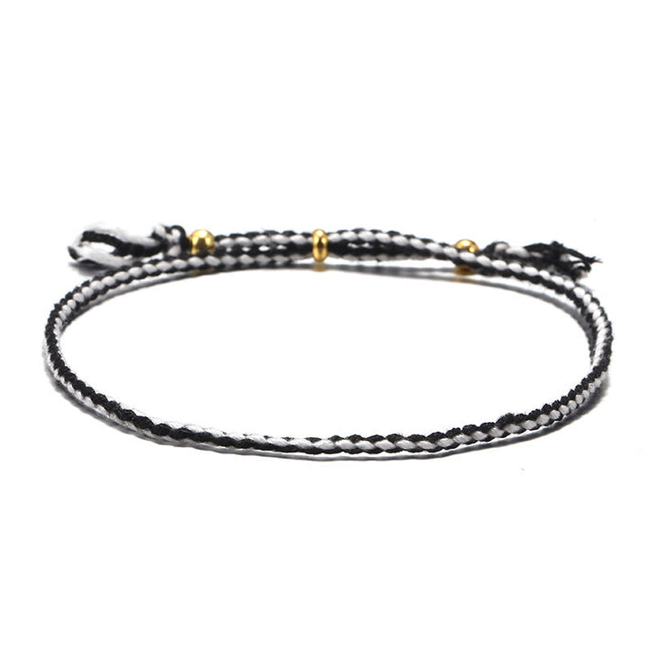 Pulsera de armonía ajustable con borlas trenzadas de cuerda de colores hecha a mano con Buddha Stones