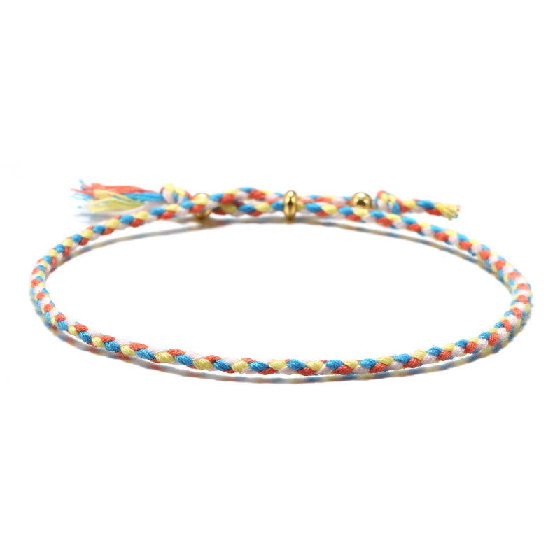 Pulsera de armonía ajustable con borlas trenzadas de cuerda de colores hecha a mano con Buddha Stones
