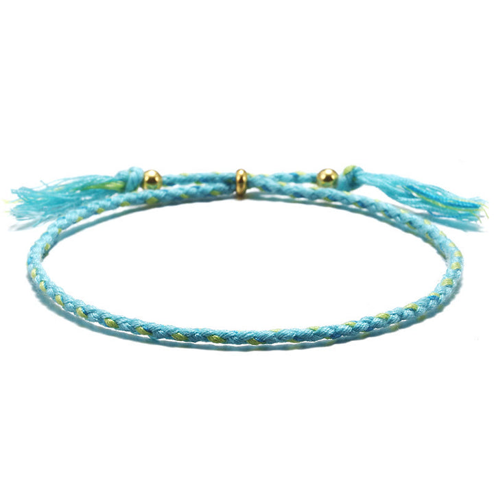 Pulsera de armonía ajustable con borlas trenzadas de cuerda de colores hecha a mano con Buddha Stones