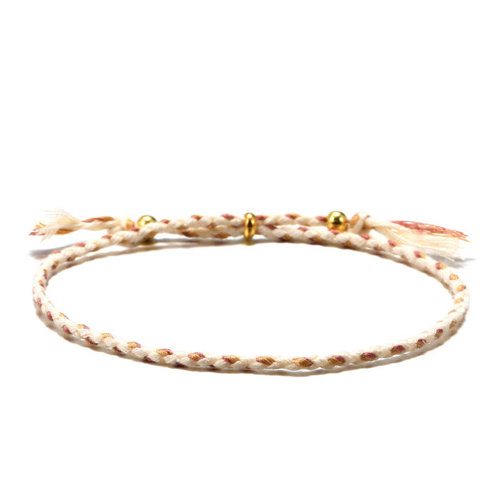 Pulsera de armonía ajustable con borlas trenzadas de cuerda de colores hecha a mano con Buddha Stones