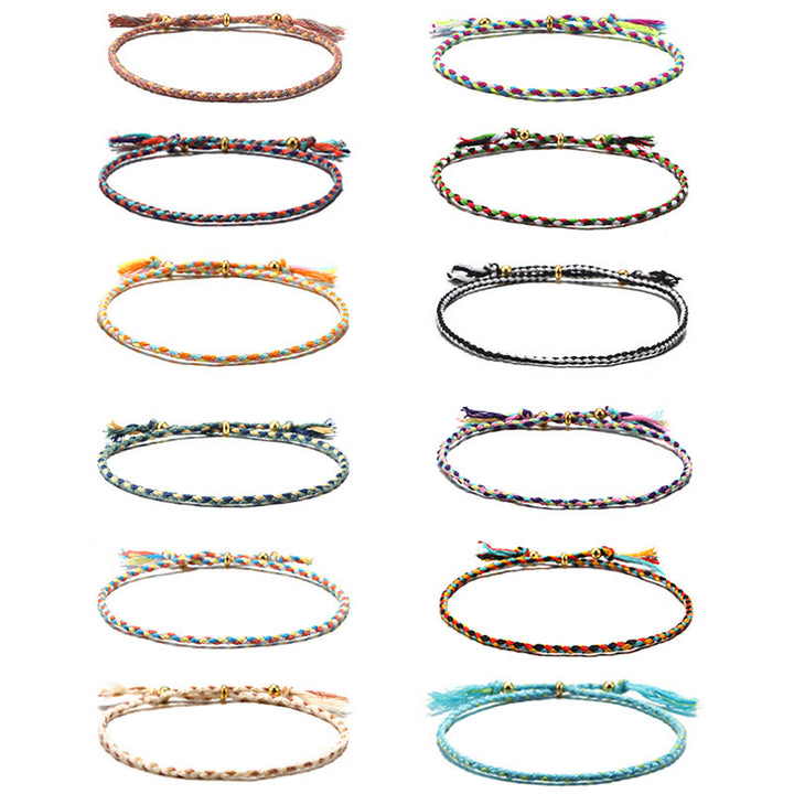 Pulsera de armonía ajustable con borlas trenzadas de cuerda de colores hecha a mano con Buddha Stones