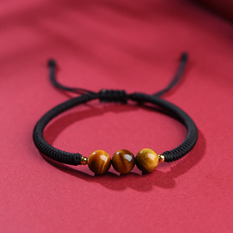 Pulsera de cuerda con cuentas de ojo de tigre y protección de la suerte hecha a mano con Buddha Stones