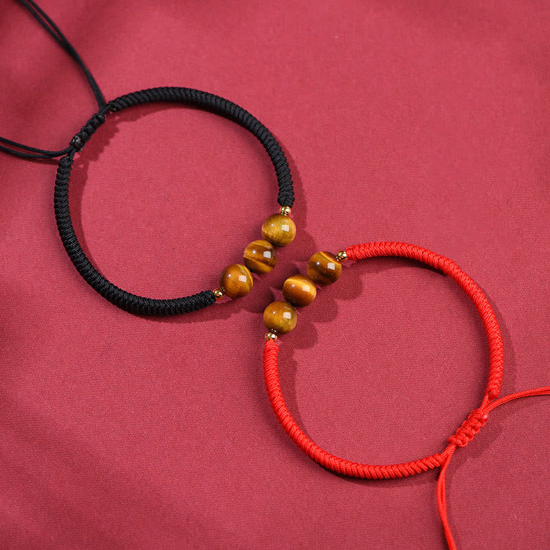 Pulsera de cuerda con cuentas de ojo de tigre y protección de la suerte hecha a mano con Buddha Stones