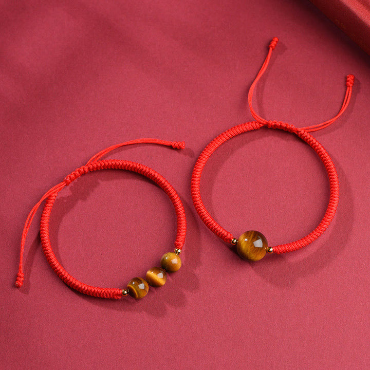 Pulsera de cuerda con cuentas de ojo de tigre y protección de la suerte hecha a mano con Buddha Stones