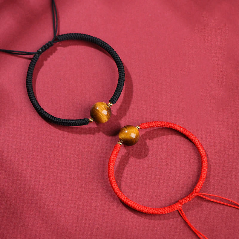 Pulsera de cuerda con cuentas de ojo de tigre y protección de la suerte hecha a mano con Buddha Stones