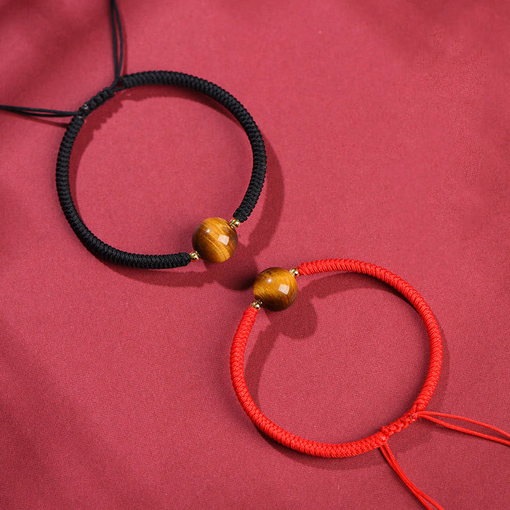 Pulsera de cuerda con cuentas de ojo de tigre y protección de la suerte hecha a mano con Buddha Stones