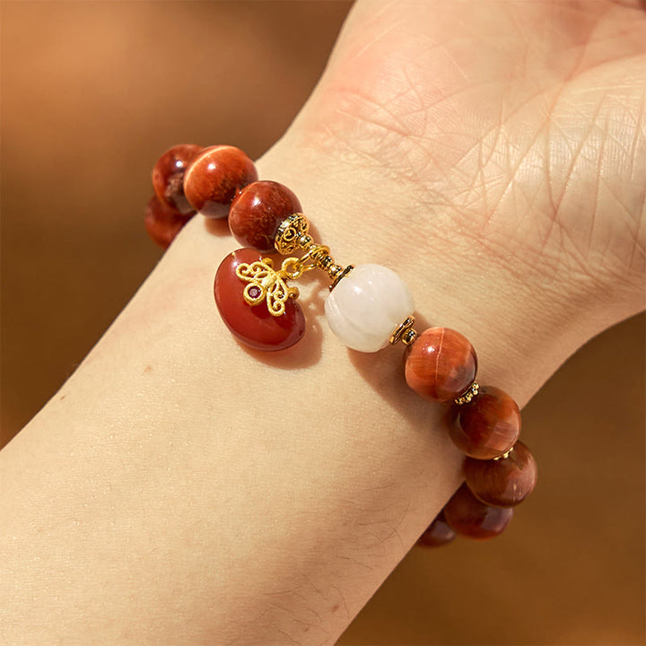 Pulsera de Buddha Stones con ojo de tigre rojo natural y calabaza calmante