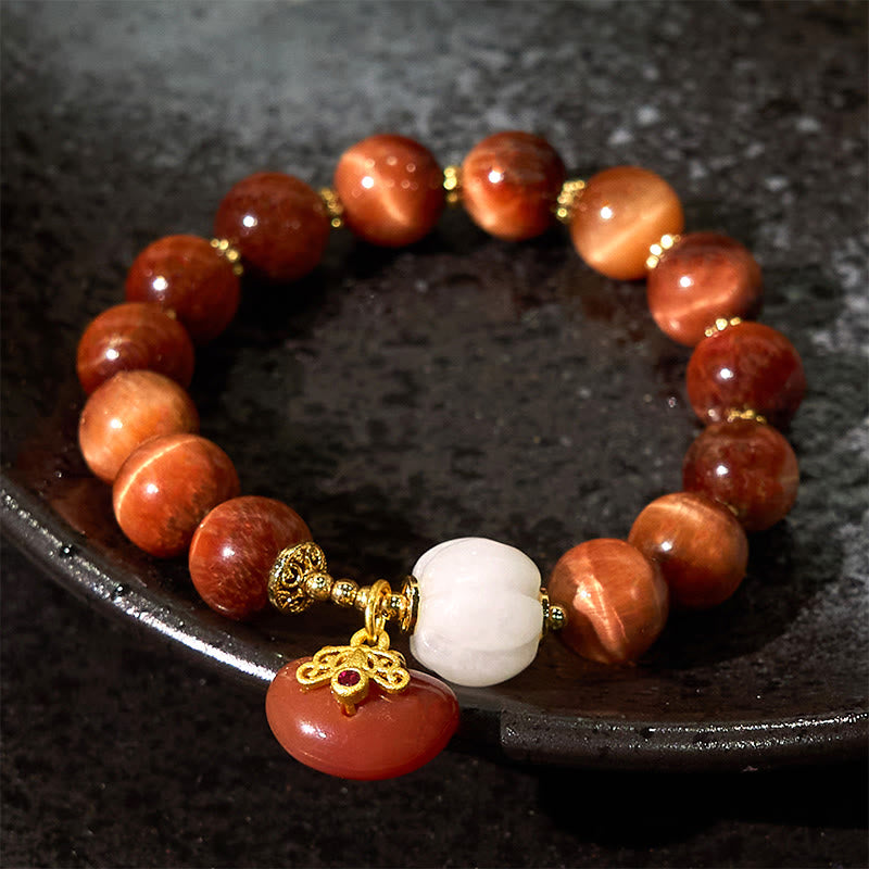 Pulsera de Buddha Stones con ojo de tigre rojo natural y calabaza calmante