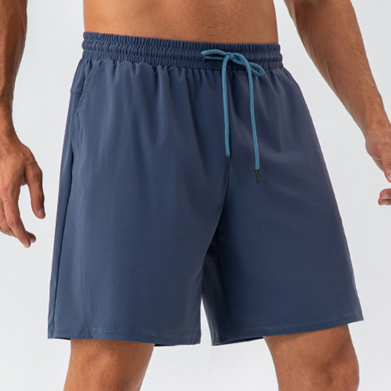 Pantalones cortos deportivos de nailon, sueltos, transpirables y de secado rápido para hombre de Buddha Stones con bolsillos