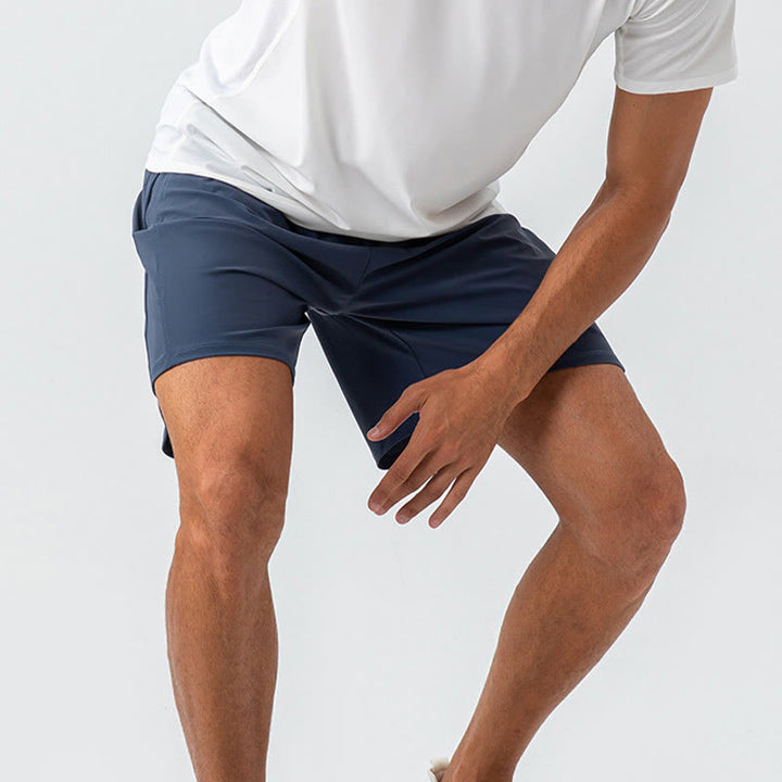 Pantalones cortos deportivos de nailon, sueltos, transpirables y de secado rápido para hombre de Buddha Stones con bolsillos