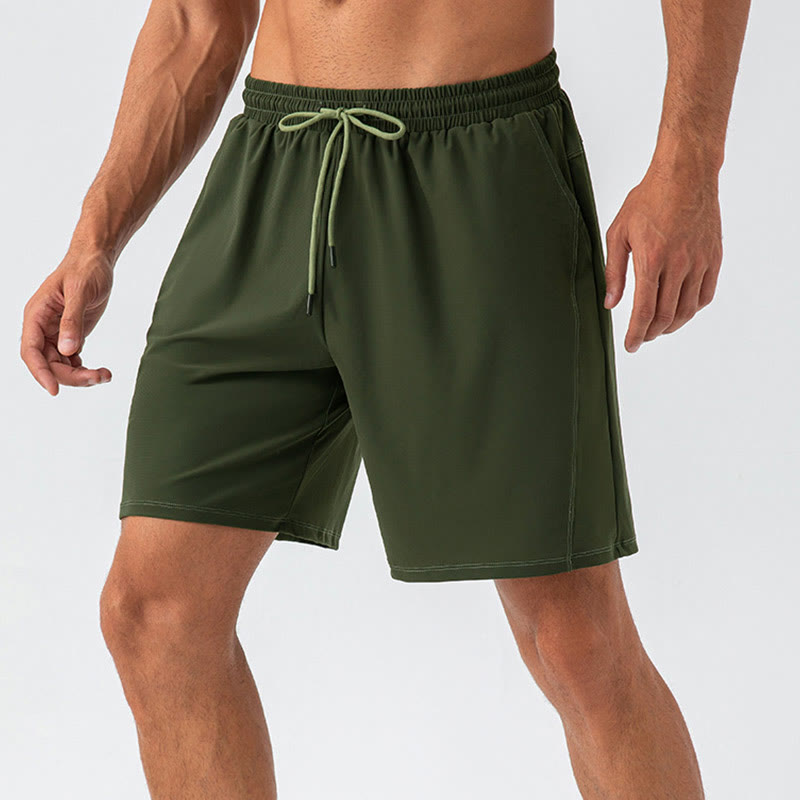 Pantalones cortos deportivos de nailon, sueltos, transpirables y de secado rápido para hombre de Buddha Stones con bolsillos