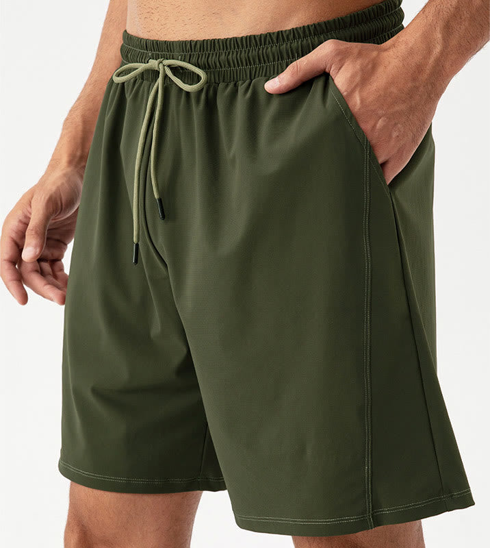 Pantalones cortos deportivos de nailon, sueltos, transpirables y de secado rápido para hombre de Buddha Stones con bolsillos
