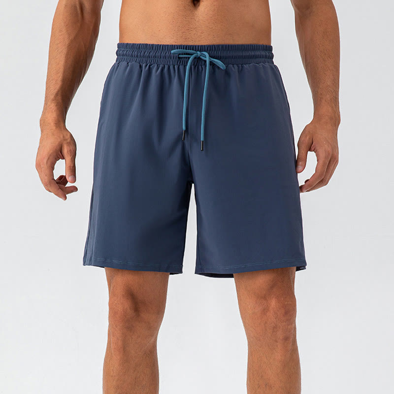 Pantalones cortos deportivos de nailon, sueltos, transpirables y de secado rápido para hombre de Buddha Stones con bolsillos