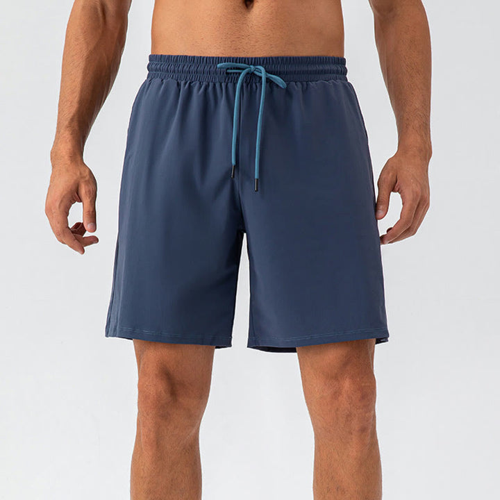 Pantalones cortos deportivos de nailon, sueltos, transpirables y de secado rápido para hombre de Buddha Stones con bolsillos