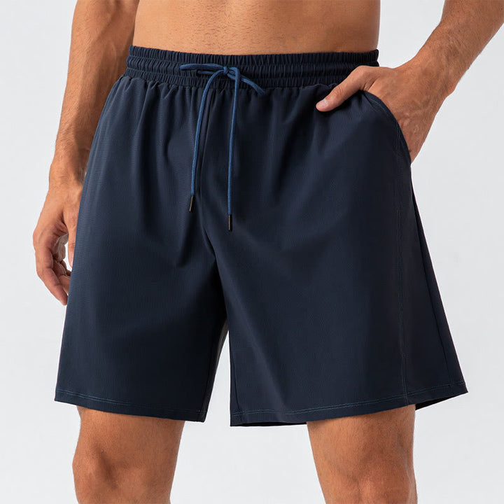 Pantalones cortos deportivos de nailon, sueltos, transpirables y de secado rápido para hombre de Buddha Stones con bolsillos