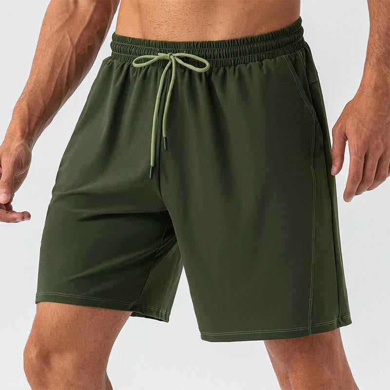 Pantalones cortos deportivos de nailon, sueltos, transpirables y de secado rápido para hombre de Buddha Stones con bolsillos