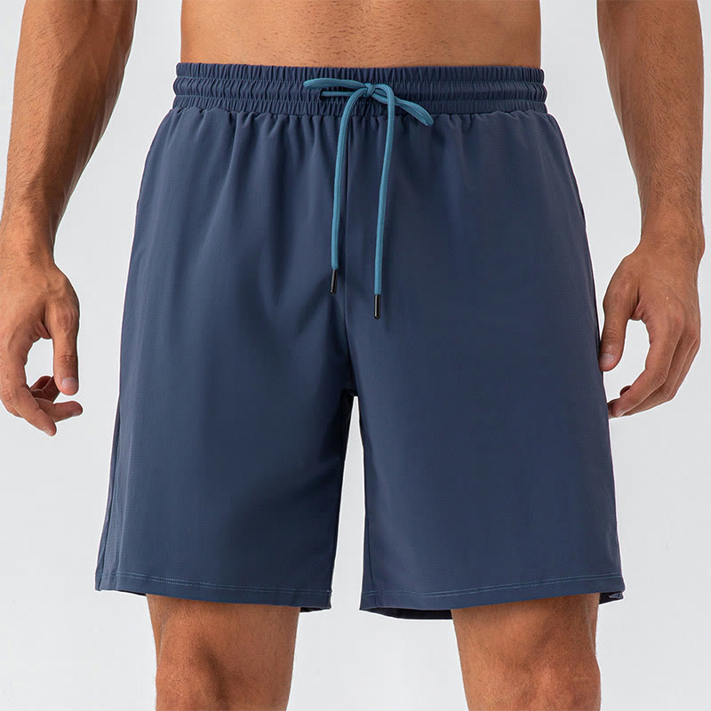 Pantalones cortos deportivos de nailon, sueltos, transpirables y de secado rápido para hombre de Buddha Stones con bolsillos