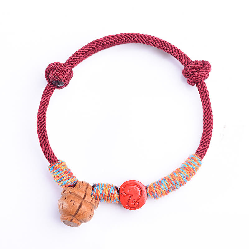 Pulsera de la suerte hecha a mano con Buddha Stones y cinabrio de hueso de melocotón con hilo rojo del zodíaco chino
