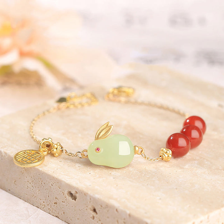 Pulsera con hebilla de cadena con símbolo de la suerte de conejo y jade hetiano con cuentas de ágata roja y Buddha Stones