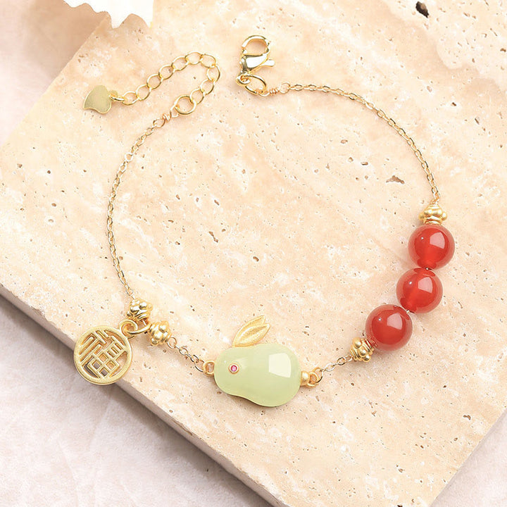 Pulsera con hebilla de cadena con símbolo de la suerte de conejo y jade hetiano con cuentas de ágata roja y Buddha Stones
