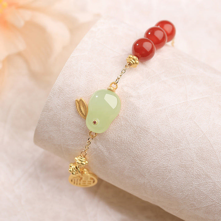 Pulsera con hebilla de cadena con símbolo de la suerte de conejo y jade hetiano con cuentas de ágata roja y Buddha Stones